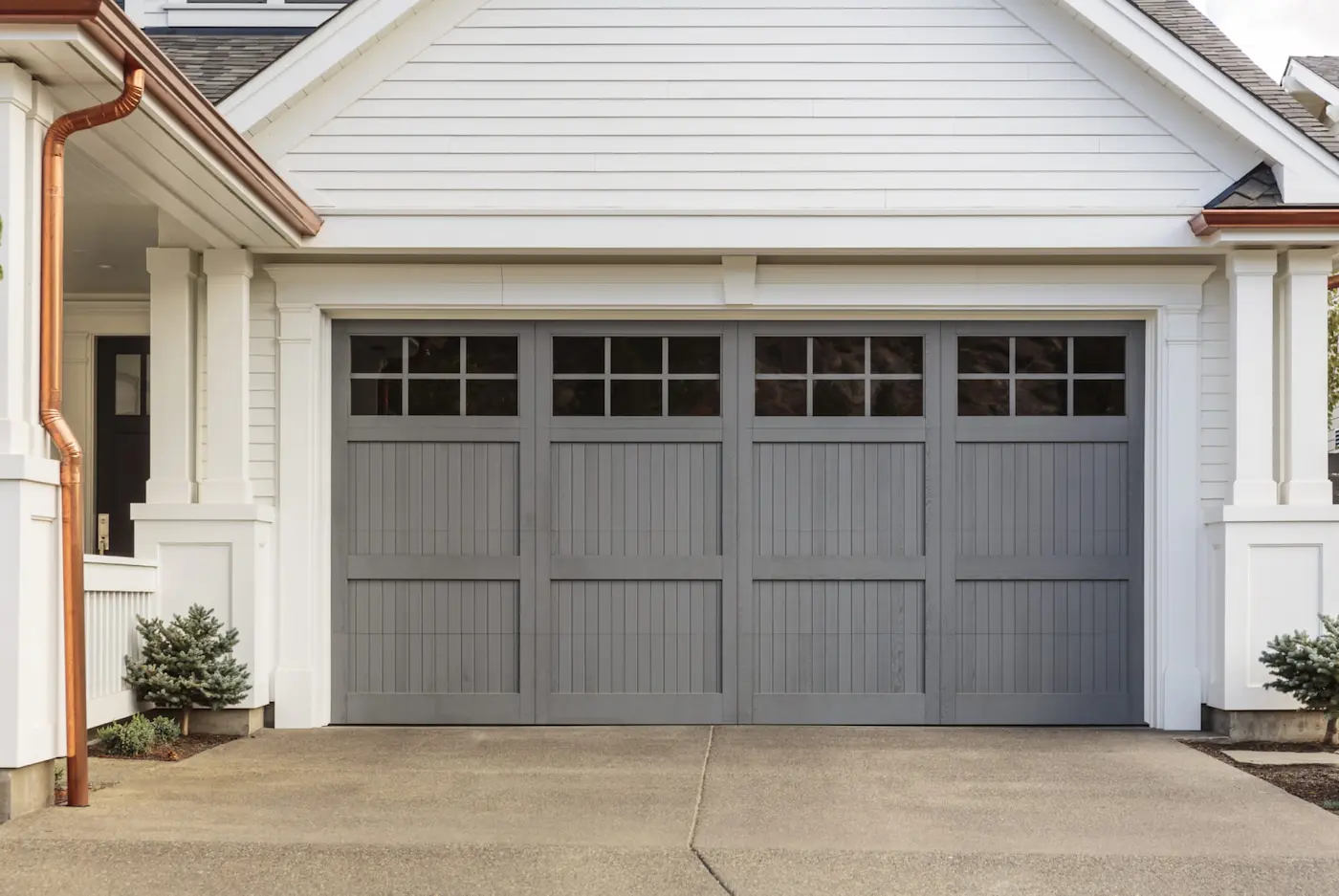Gray garage door with window inserts 2 Gray garage door with window inserts